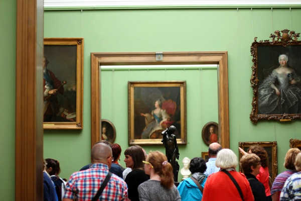 Travelers enjoying tour of Tretyakov Gallery in Russia