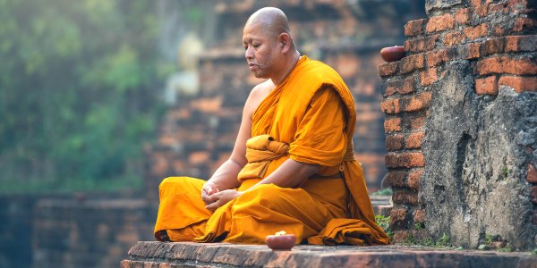 Monk mediating in Myanmar on tour with Intrepid Travel