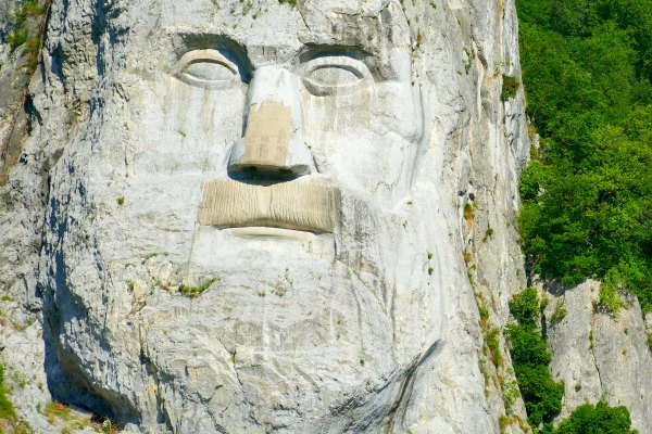 Carved face along the Iron Gates gorge on Danube River