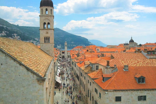 Tourists and locals walking in historic Dubrovnik, Croatia