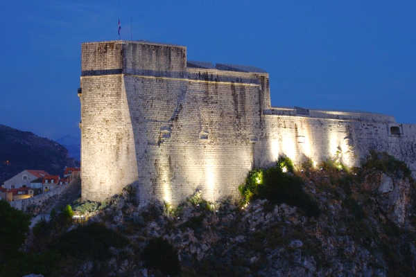 Fort Lovrijenac lit up at night in Dubrovnik, croatia