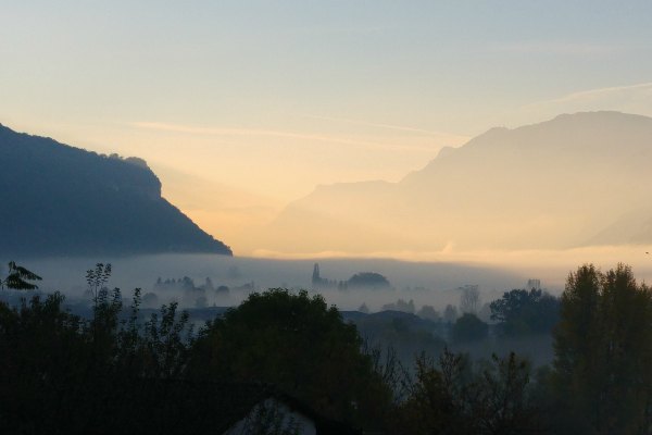 Misty mountain town in France