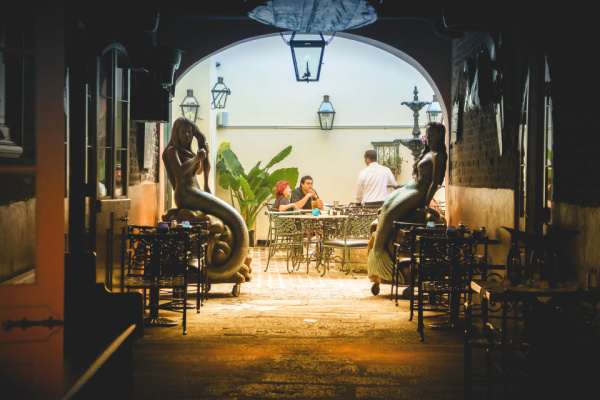 Couple dining at French Quarter restaurant in New Orleans