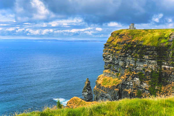 Dramatic Irish coastline with castle