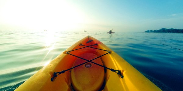 Sea kayaking at sunrise