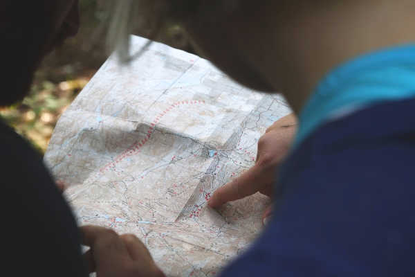 Lost couple traveling using a map