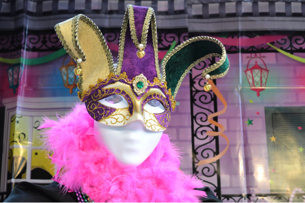 Mardi gras mask and boa for sale in New Orleans