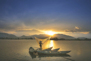 Fisherman on the mekong river