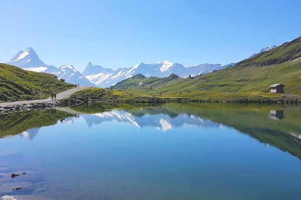 Lake and hikers in switzerland