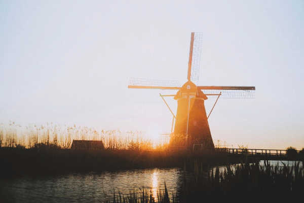 Windmill at sunset in the netherlands
