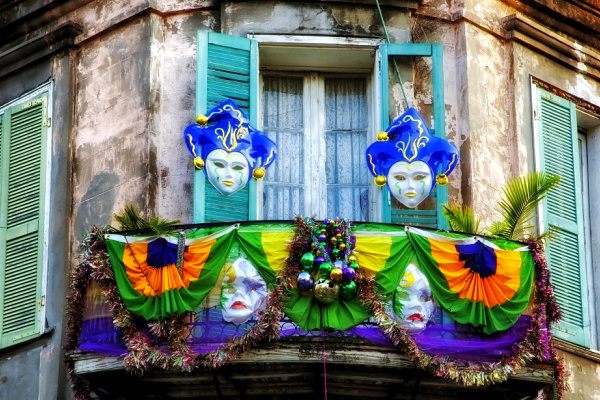 Mardi gras masks and colorful balcony in New Orleans