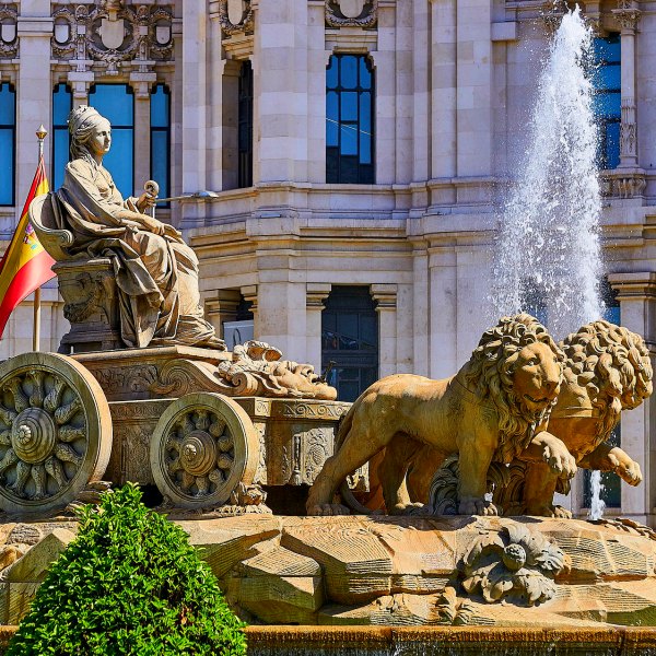 Spain statue and flag