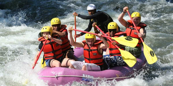 White water rafting group on a Trek America tour