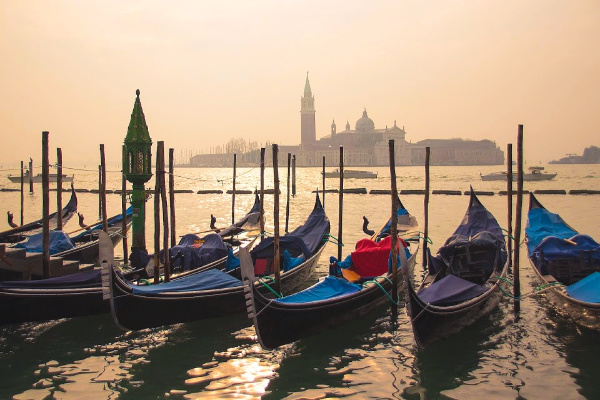 Gondolas docked in Venice Italy