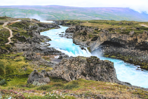 springtime waterfall in iceland