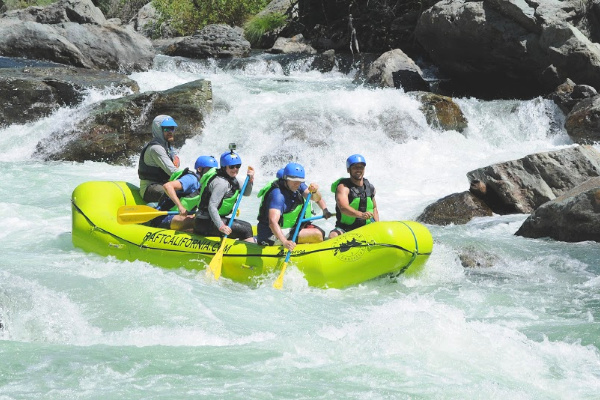 Stride team whitewater rafting on American river