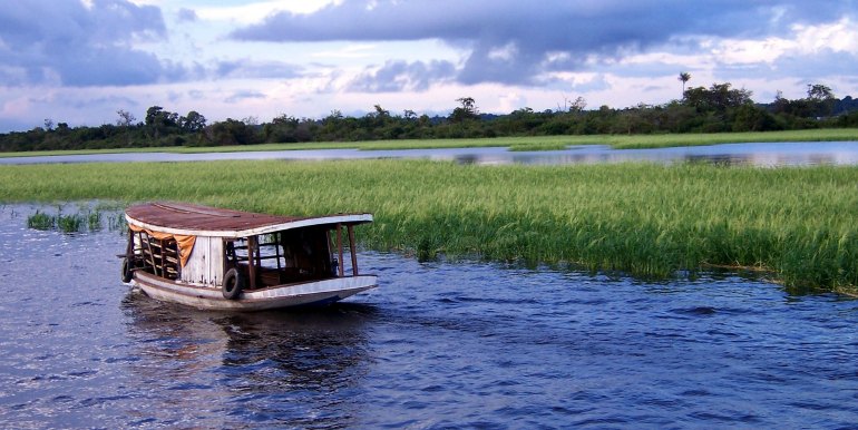 Small river boat on the Amazon