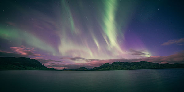 The Northern Lights in Alftavatn, Iceland.