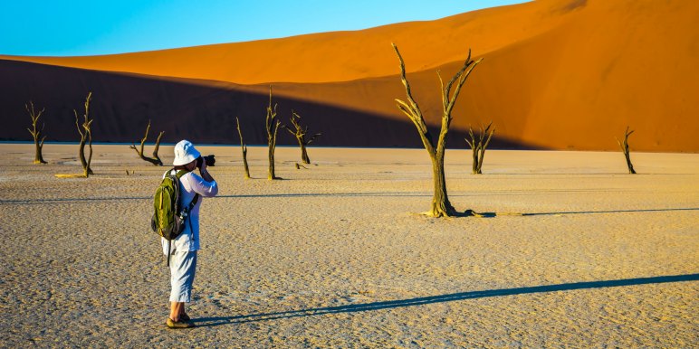 Traveling taking photographs in Namibia
